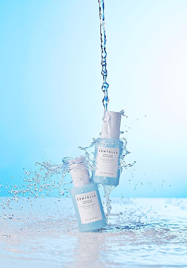Lightweight blue serum texture applied on skin close up